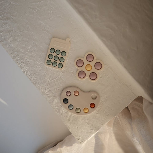 Mushie pop it rotaļlieta Phone Tradewinds