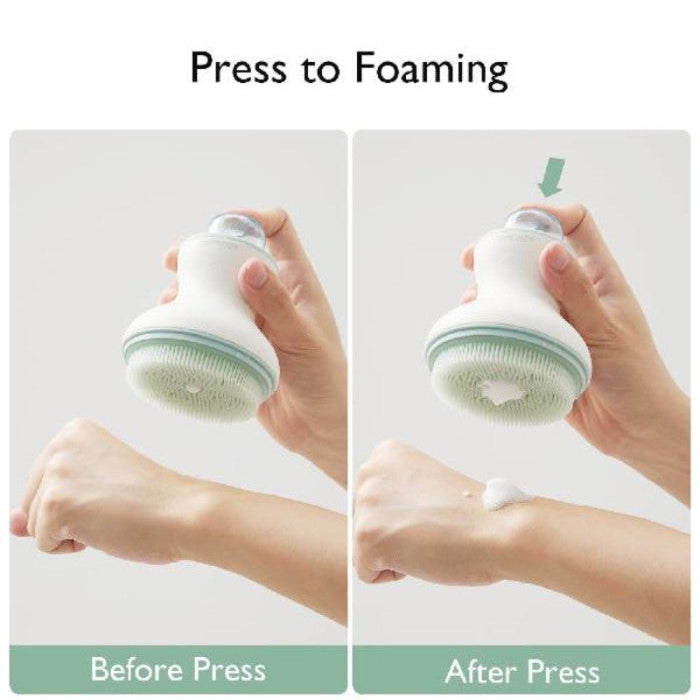 Mushie izglītojoša silikona zobu birste (Shifting Sand)