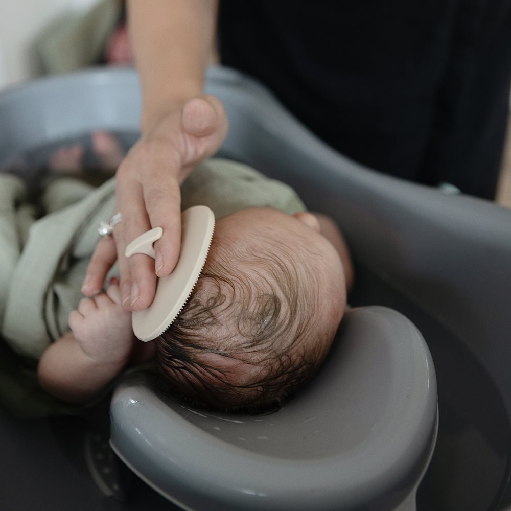 Mushie izglītojoša silikona zobu birste (Shifting Sand)