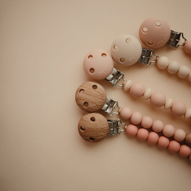 Mushie knupīša turētājs Luna Blush