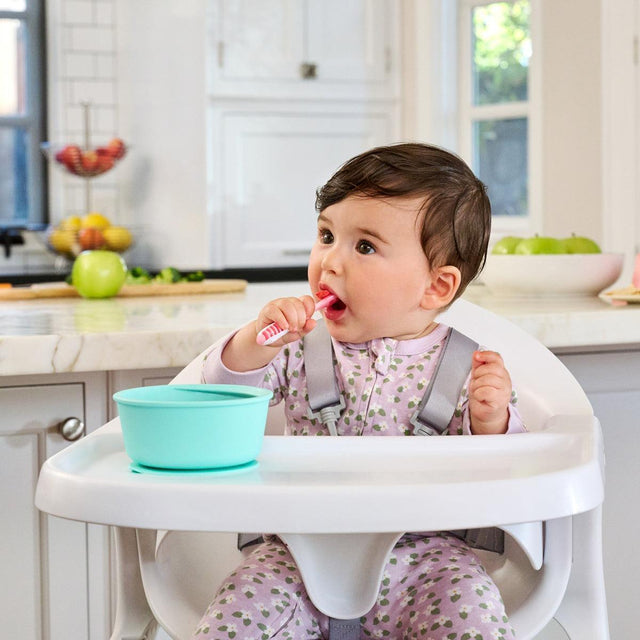 Munchkin īpaši mīkstas silikona barošanas karotes (rozā un ceriņkrāsā)