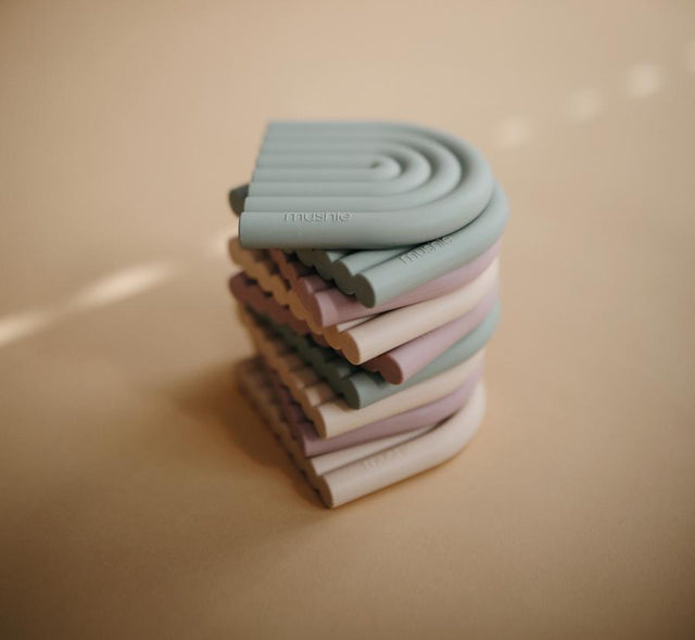 Mushie košļājama rozā varavīksne (Mauve)