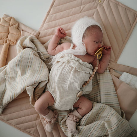 Mushie (ceļojumu) pārģērbšanās paklājiņš Vaigu sārtums