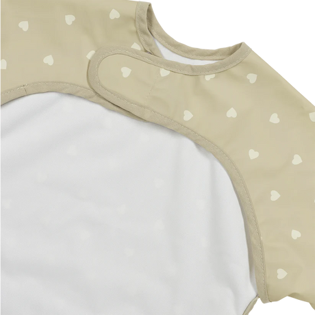 Meyco Baby neperšlampamas seilinukas su rankovėmis 6–24 mėn., Sweet Heart Sand/Soft Sand