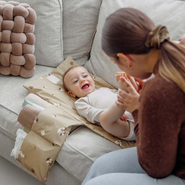 Mushie (ceļojumu) pārģērbšanās paklājiņš Vaigu sārtums 