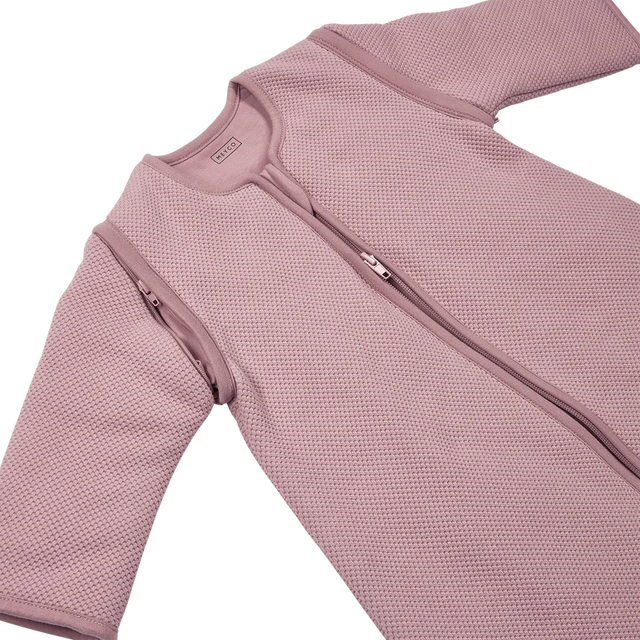 Meyco Baby Studio miegmaišis su kojytėmis, nusegamomis rankovėmis ir atverčiamomis kojinėmis TOG 2.5 Purple Pink