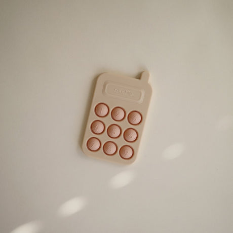 Mushie pop it rotaļlieta Phone Tradewinds 