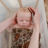 Mushie izglītojoša silikona zobu birste (Shifting Sand) 