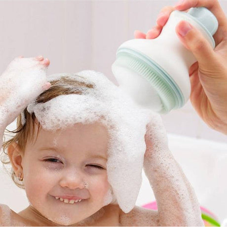 Mushie izglītojoša silikona zobu birste (Shifting Sand) 