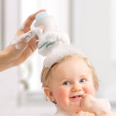 Mushie izglītojoša silikona zobu birste (Shifting Sand) 